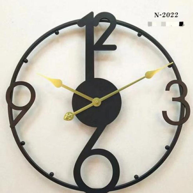 BLACK SYMMETRICAL METAL ANTIQUE WALL CLOCK