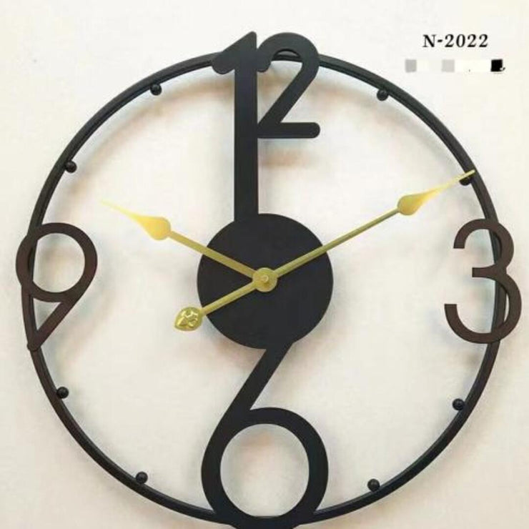 BLACK SYMMETRICAL METAL ANTIQUE WALL CLOCK