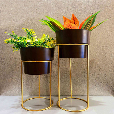 SHINY GOLDEN AND BLACK TUMBLER SHAPED PLANTER