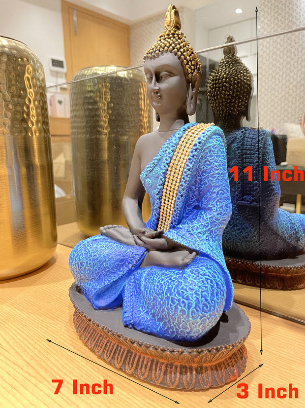 Intricately designed multi colored Gautam Buddha idol