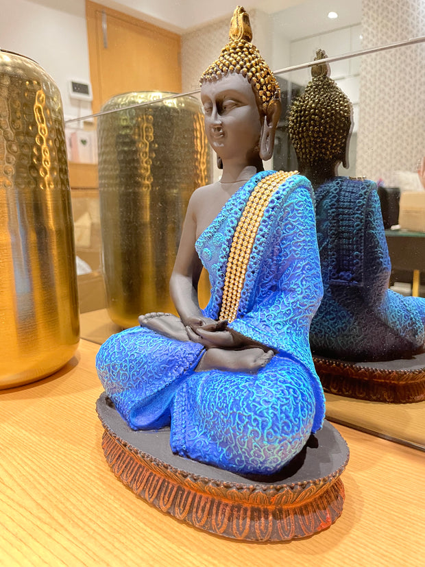 Intricately designed multi colored Gautam Buddha idol