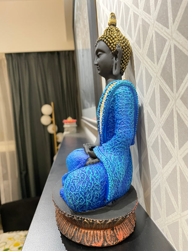 Intricately designed multi colored Gautam Buddha idol