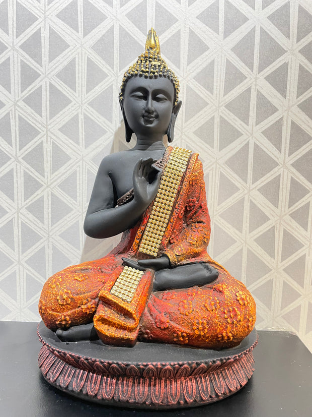 Intricately designed multi colored Gautam Buddha idol