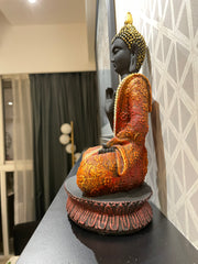 Intricately designed multi colored Gautam Buddha idol