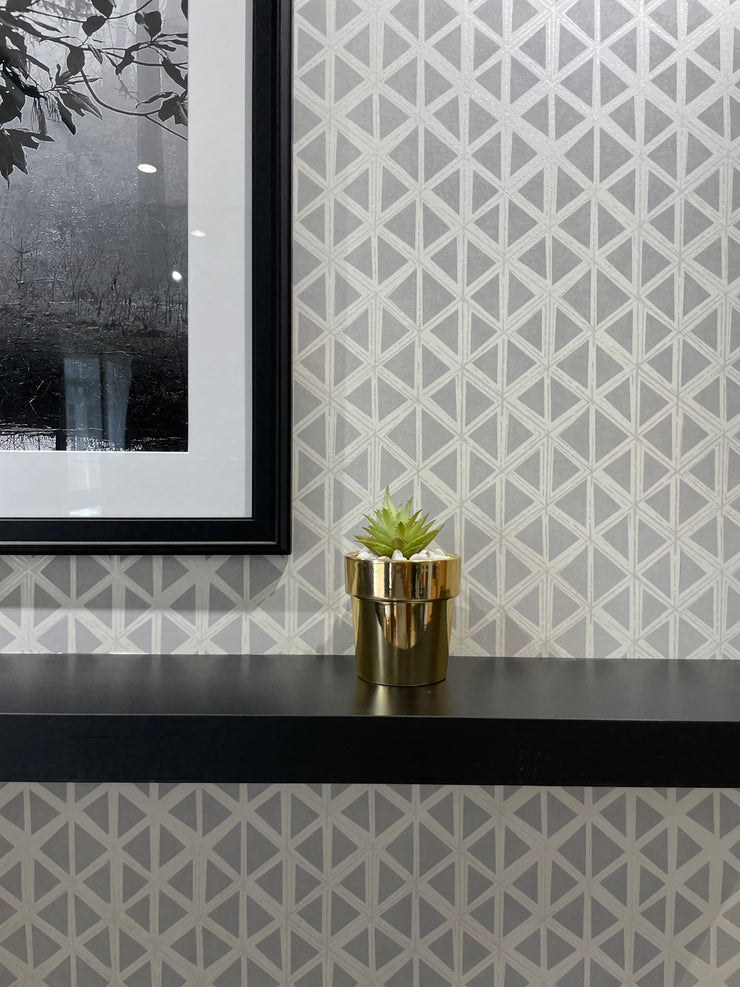 GOLDEN CERAMIC PLANTER WITH ARTIFICIAL LEAVES