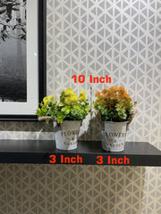 WHITE METAL PLANTER WITH ARTIFICIAL FLOWERS AND LEAVES