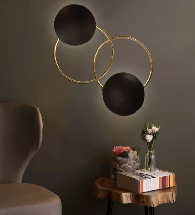 SPELLBINDING  ELLIPTICAL WALL LAMP WITH ANTIQUE TOUCH