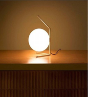 SPHEROIDAL WHITE TABLE LAMP WITH ANTIQUE BRASS FINISH