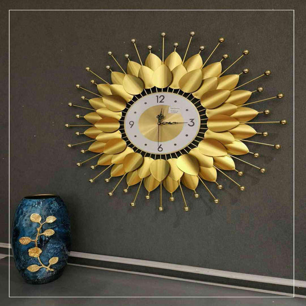 ANTIQUE GOLDEN METAL FOLIATED ANTIQUE WALL CLOCK